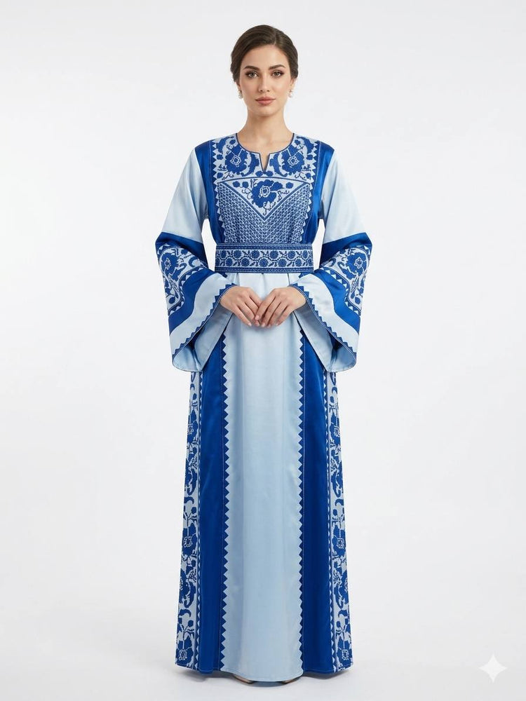 ثوب نسائي مطرز باللون الأزرق الفاتح بتصميم طويل محتشم وأكمام واسعة